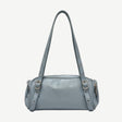 Bolso Barrel Sky Blue en material vegano premium con diseño cilíndrico, doble asa ajustable y cremalleras laterales. Ligero, moderno y versátil para looks diarios y minimalistas.