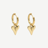 Pendientes Corazón Alargado en aleación con chapado en oro flash, diseño minimalista y charm de corazón alargado. Elegantes y ligeros para looks diarios o de noche.