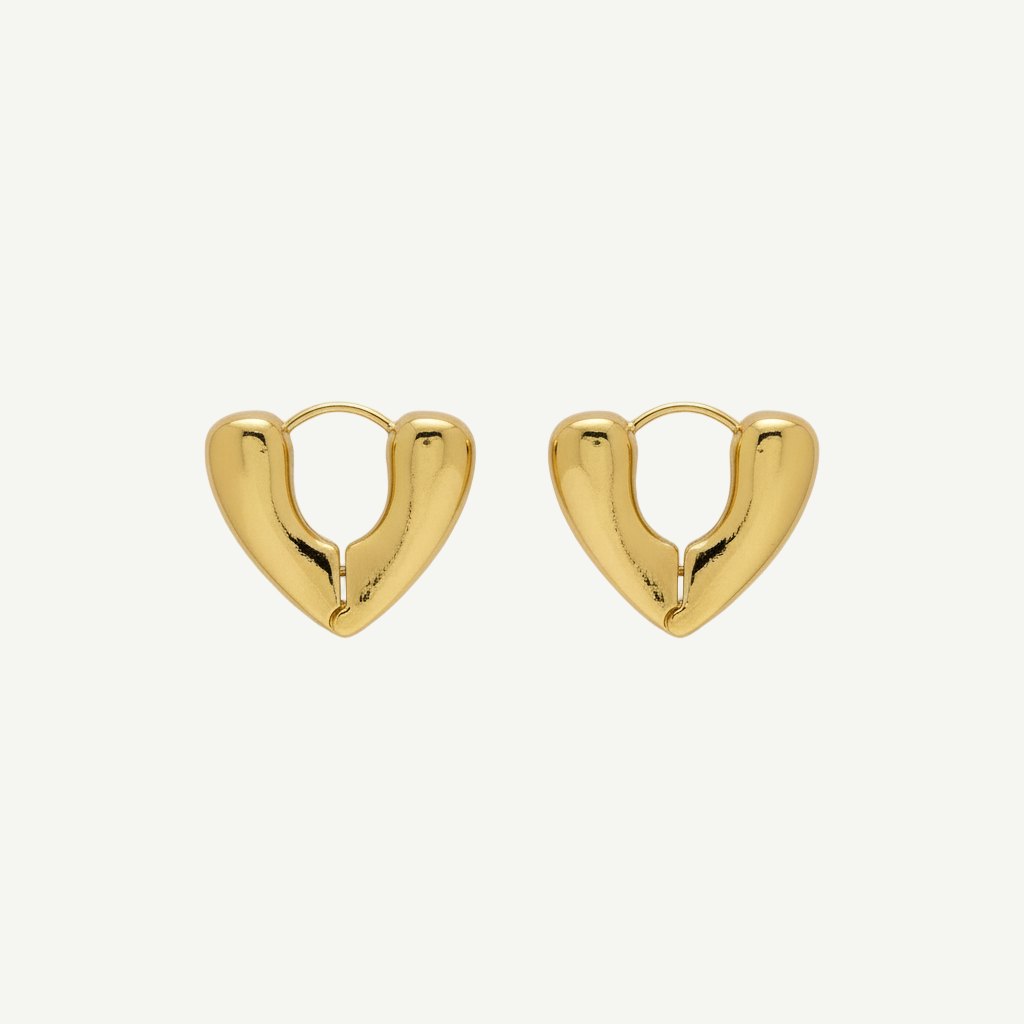 Pendientes dorados Corazón Bold con forma redondeada, acabado pulido y aro seguro, diseño voluminoso y ligero.